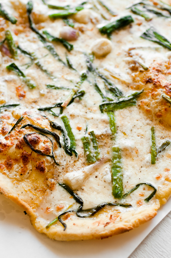 Triple-garlic pizza gluten-free pizza with garlic oil, confit, wild garlic, truffle oil