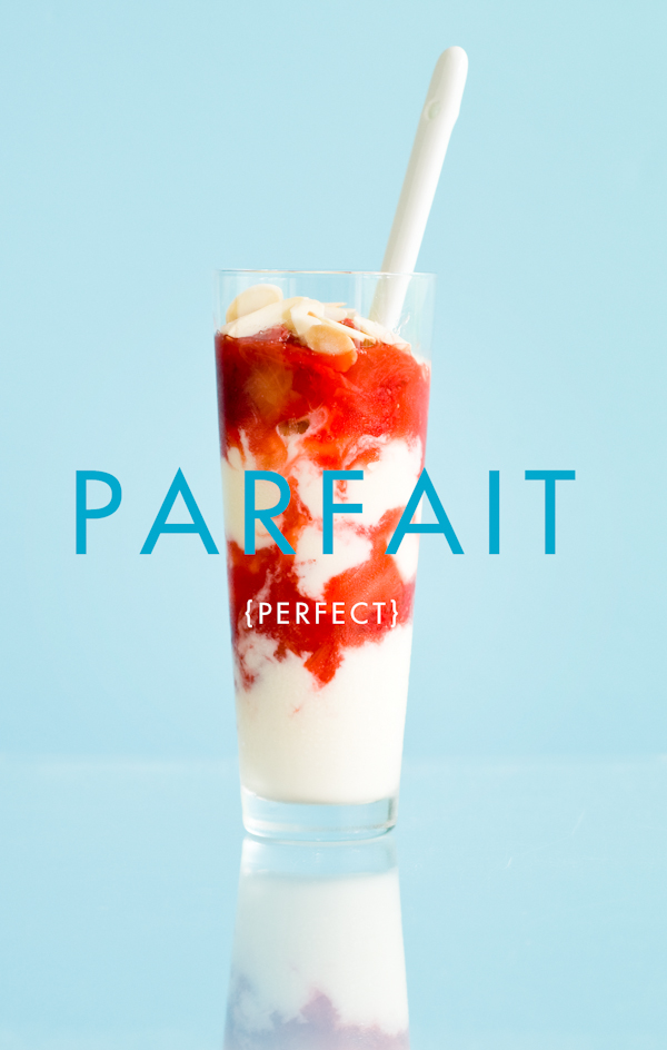 Parfait of dairy-free coconut ice cream and rhubarb-strawberry topping with slivered almonds